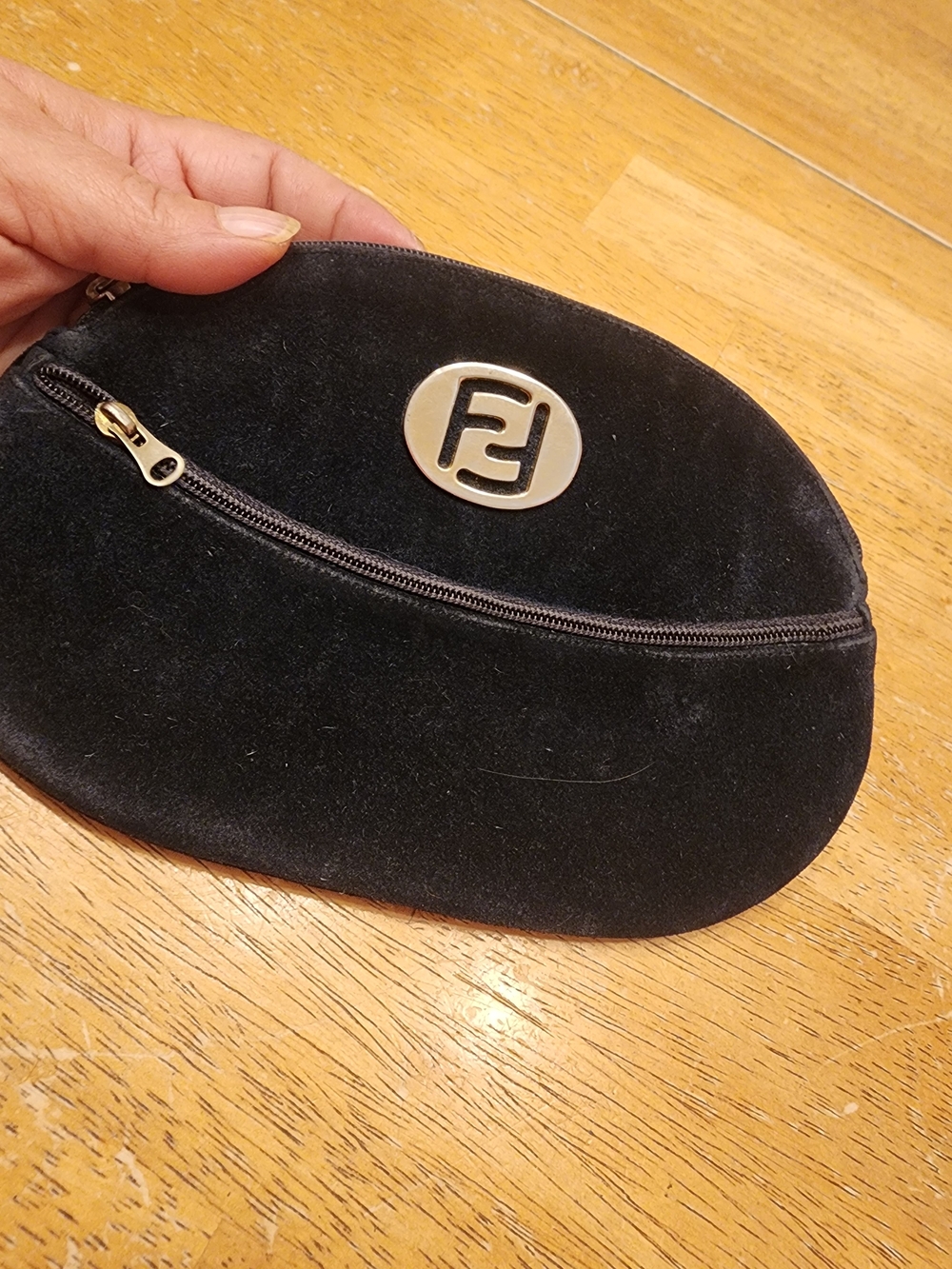 vintage Fendi black velvet pouch featuring an oval design metallic Plaque